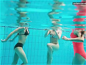trio naked nymphs have joy underwater