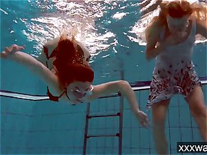 torrid Russian girls swimming in the pool