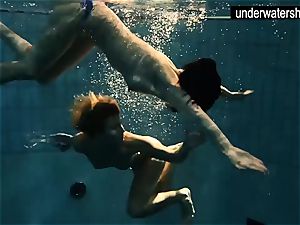 two mind-blowing amateurs showcasing their bods off under water